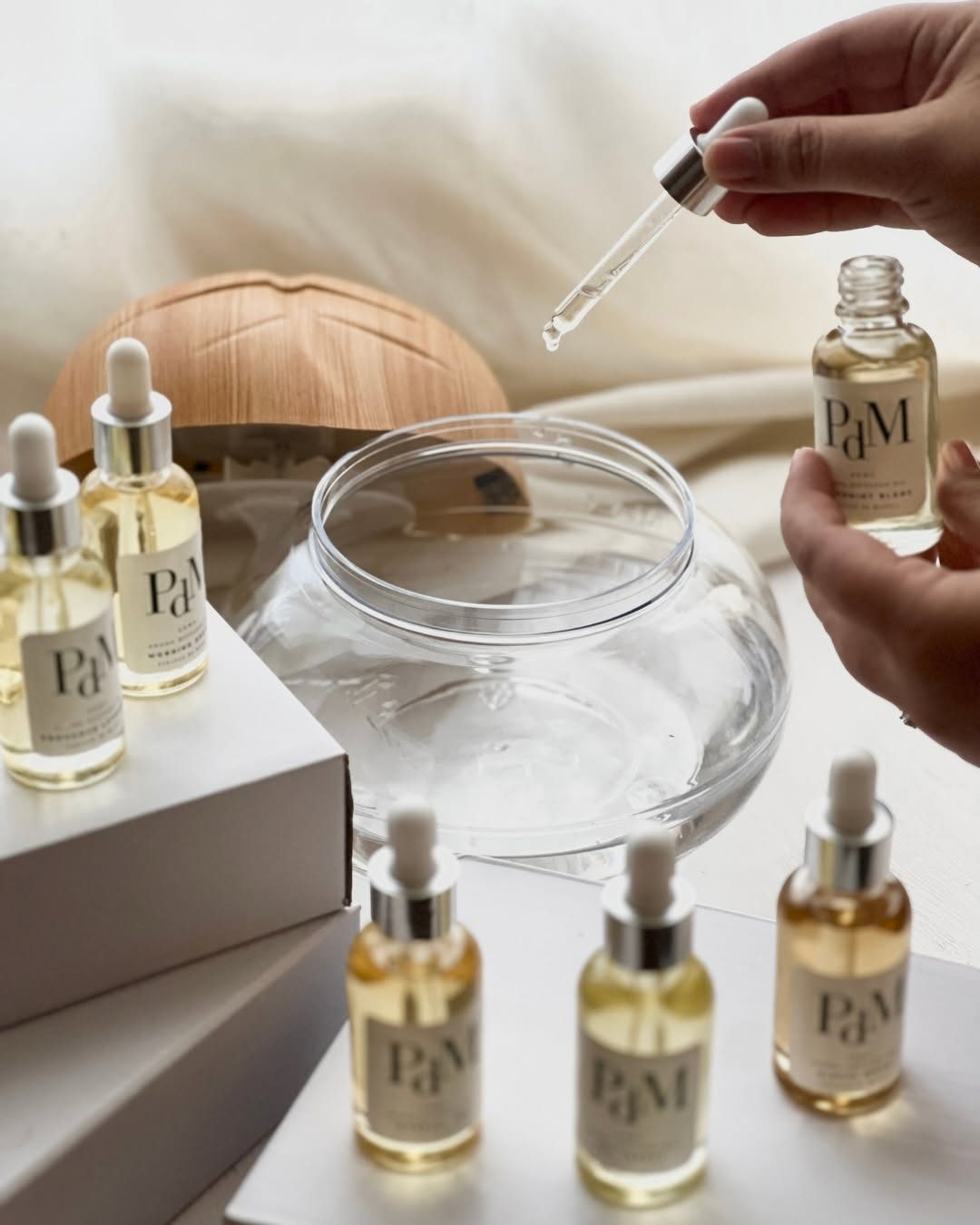 Aroma diffuser oil being added to a diffuser